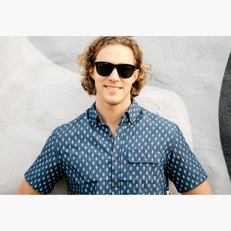 Knockaround Black Ocean Premium Sunglasses on male model wearing button up shirt
