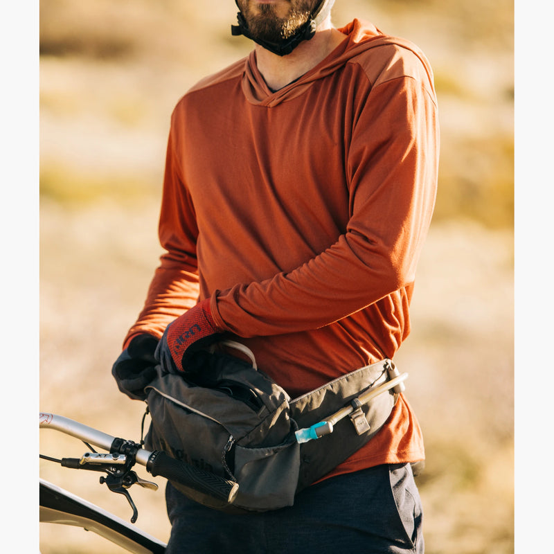 Yuba Long Sleeve Brick Hoodie on a male model at sunset