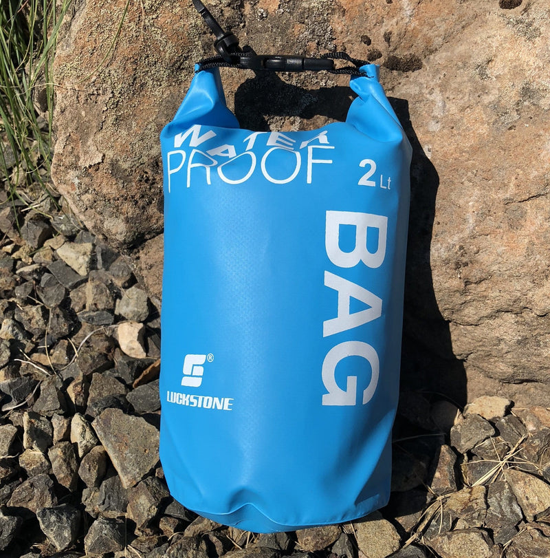 Waterproof Dry Bag--Blue on rocks