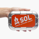 Adventure Medical Traverse Survival Kit -- hand view