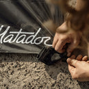 Matador Pocket Blanket 3.0--ground stake action shot