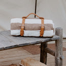 Trek Light Leather Blanket Carrier - table view