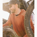 Yuba Long Sleeve Brick Hoodie on a male model after a bike ride