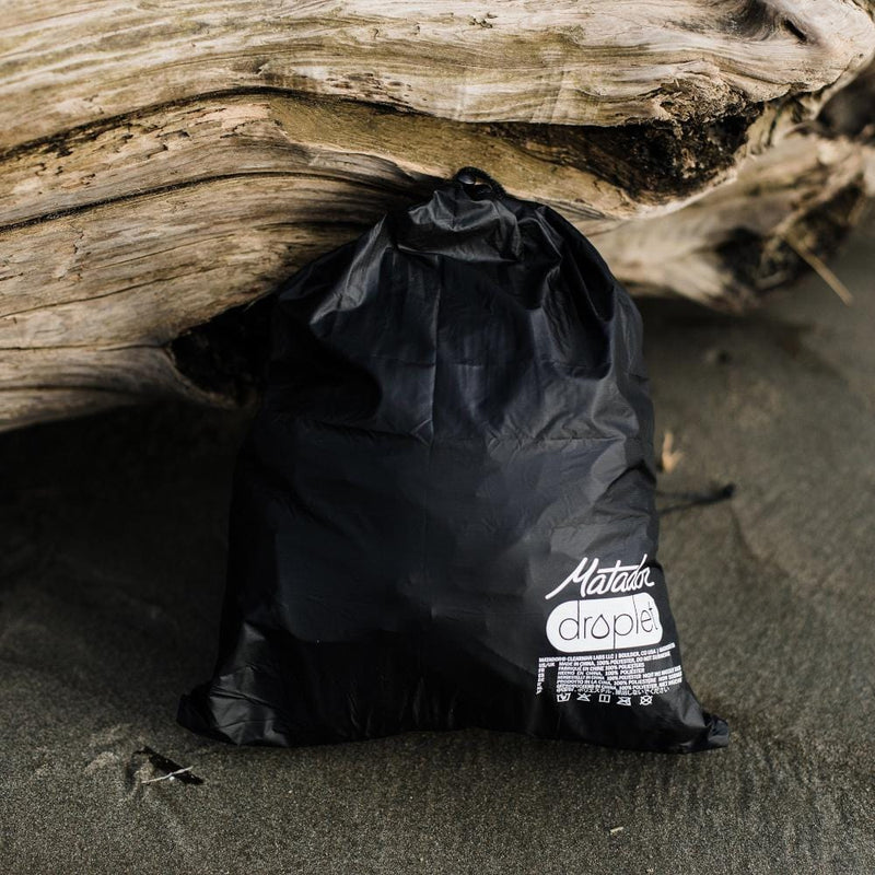 Matador Droplet Wet Bag--Black--on beach