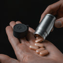 water proof travel cannister 40 ml--emptying pills into a hand