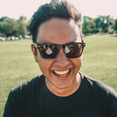 A man smiles and wears Owyhee sunglasses.
