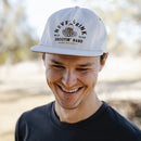 sendero shootin hand hat - man in hat smiling