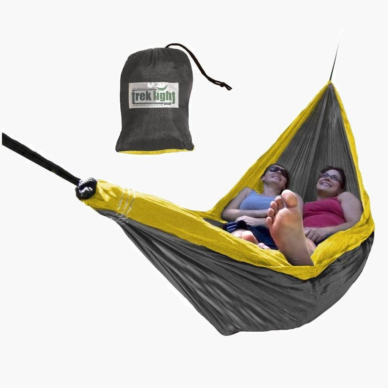 two women relaxing in a hammock