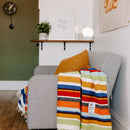 Trek Light Gear Halley's Comet Blanket--laying over couch arm